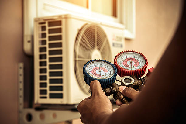 Professional Hvac Maintenance technician working in Hampstead, MD